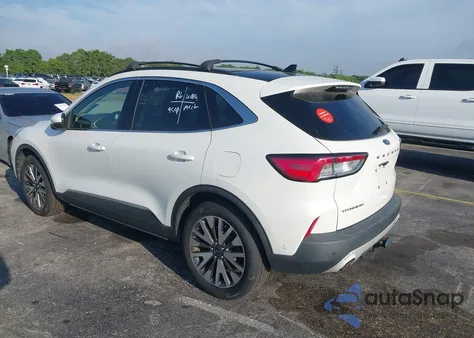 2020 Ford Escape Titanium z USA, uszkodzony, nr VIN 1FMCU9J95LUA38352